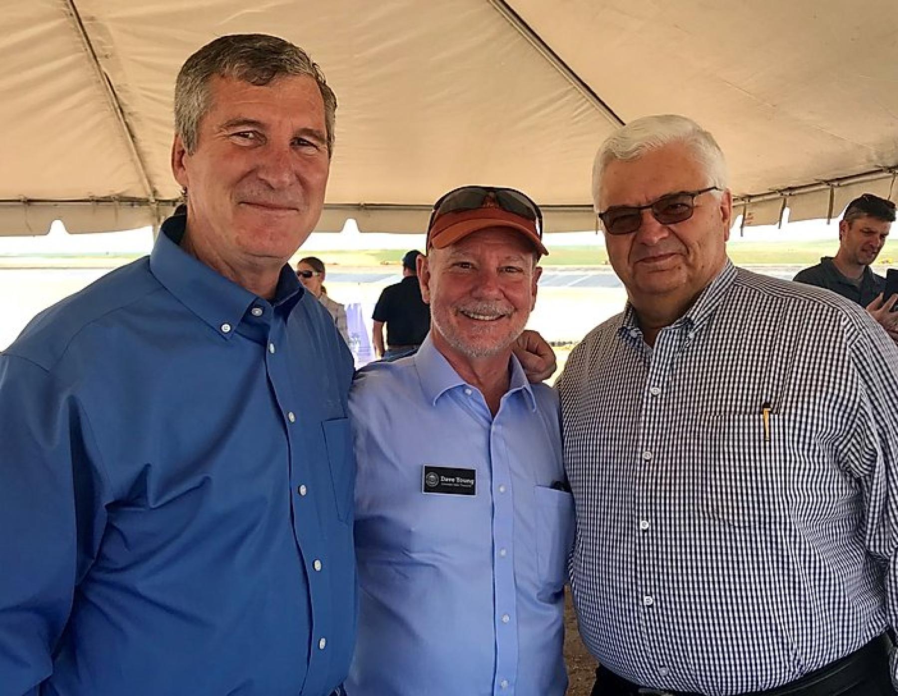 Colorado State Treasurer Dave Young, center, attended the grand opening of the 70 Ranch Reservoir in May in his home county, Weld County. He is with Ron Von Lembke, left, and Bob Lembke, right, with United Water and Sanitation District. They built the reservoir. 