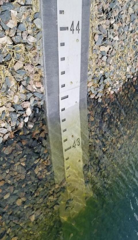 The gauge at the 70 Ranch Reservoir, whiich holds around 5,500 acre feet of water, was full this month, ahead of schedule.